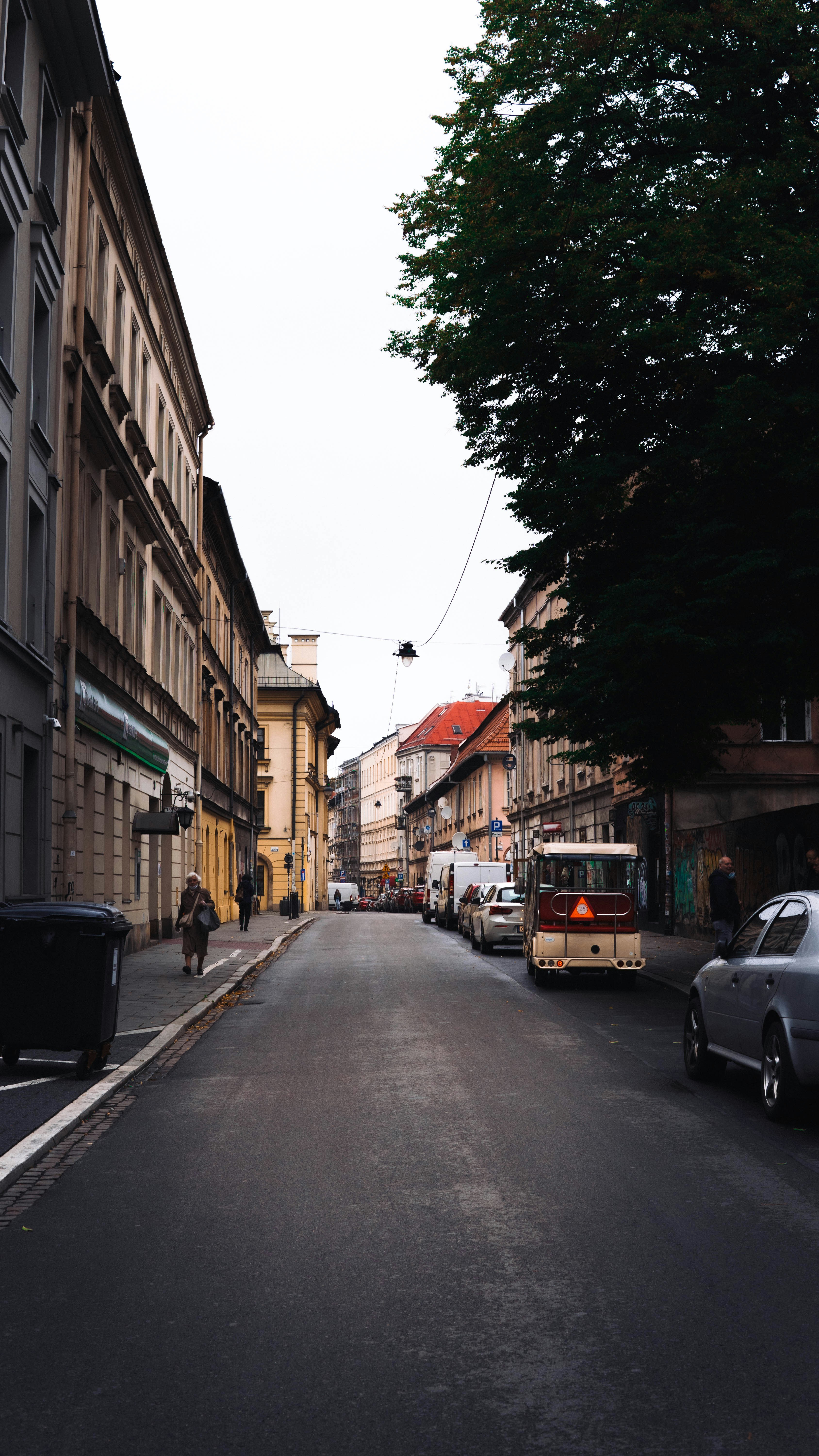 cars parked on side of the road during daytime