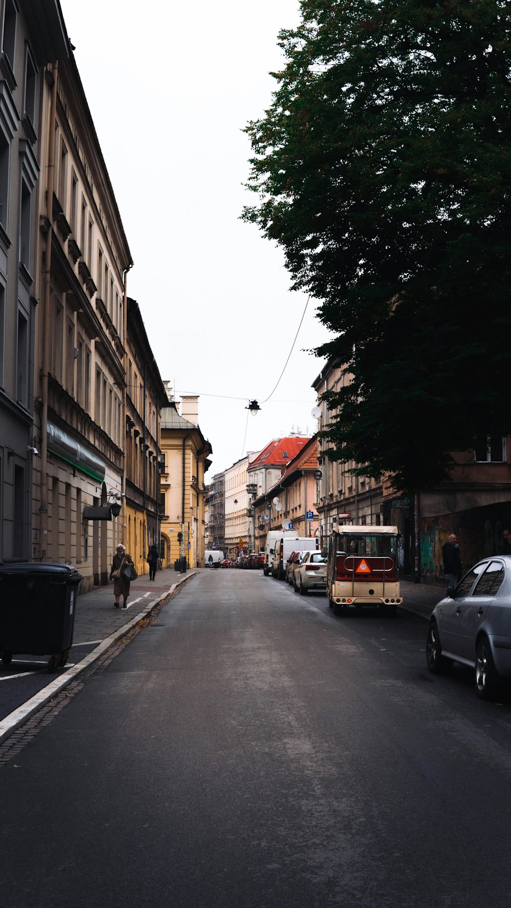 cars parked on side of the road during daytime