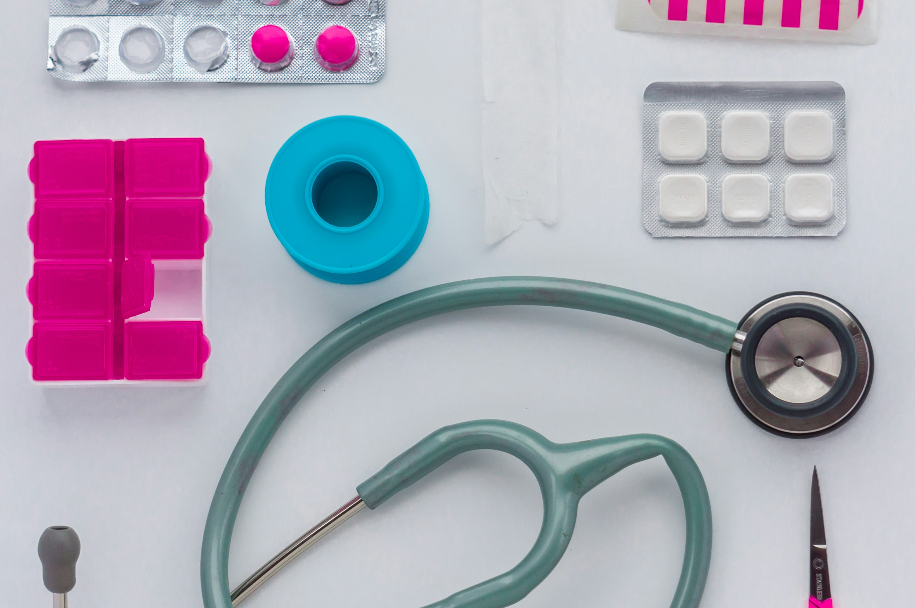 Pharmacy and doctor's attributes like stethoscope, aspirine, medicine, band-aid