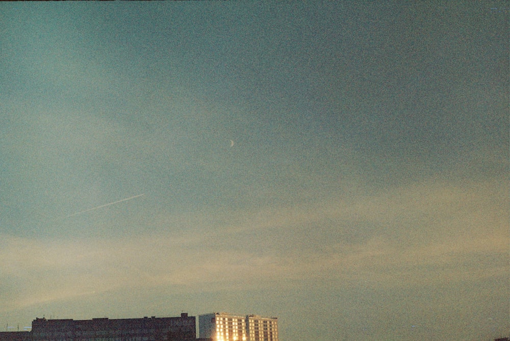 high rise buildings under blue sky