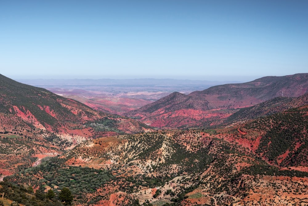 green and brown mountains under blue sky during daytime