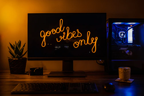 A cozy workspace filled with trading cards, memorabilia, and a computer displaying the cardvibe website.