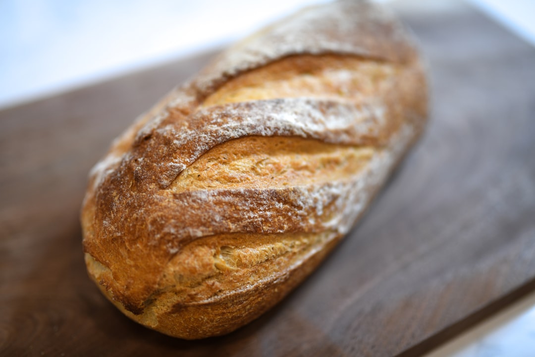 bread on brown wooden chopping board