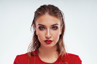 woman in red crew neck shirt