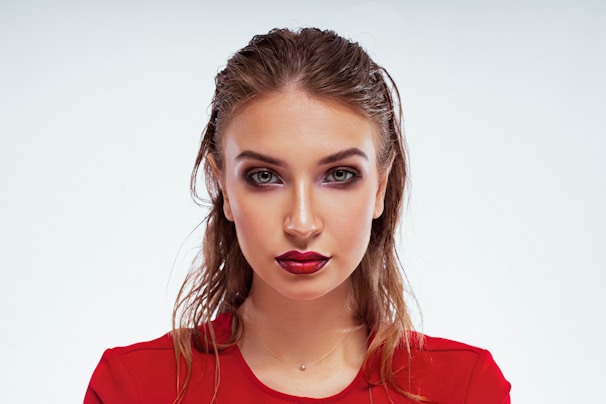 woman in red crew neck shirt