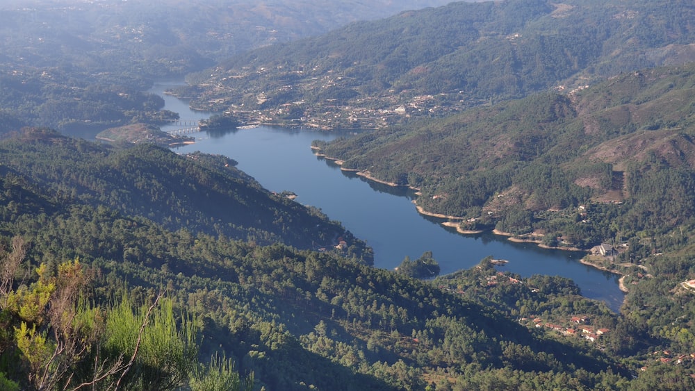 green mountains near lake during daytime