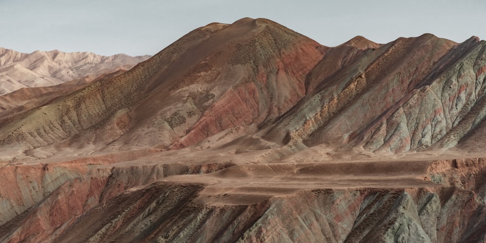 brown and gray mountains under blue sky during daytime