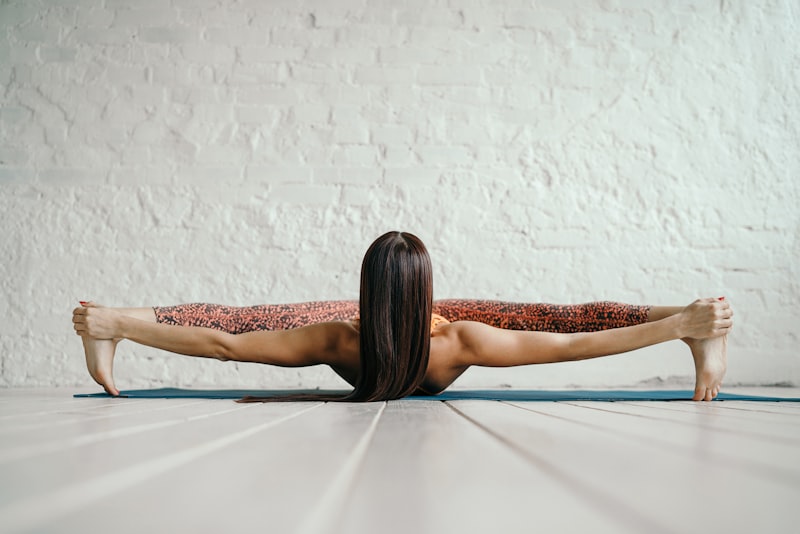 Wild Yoga Pose in patterned leggings