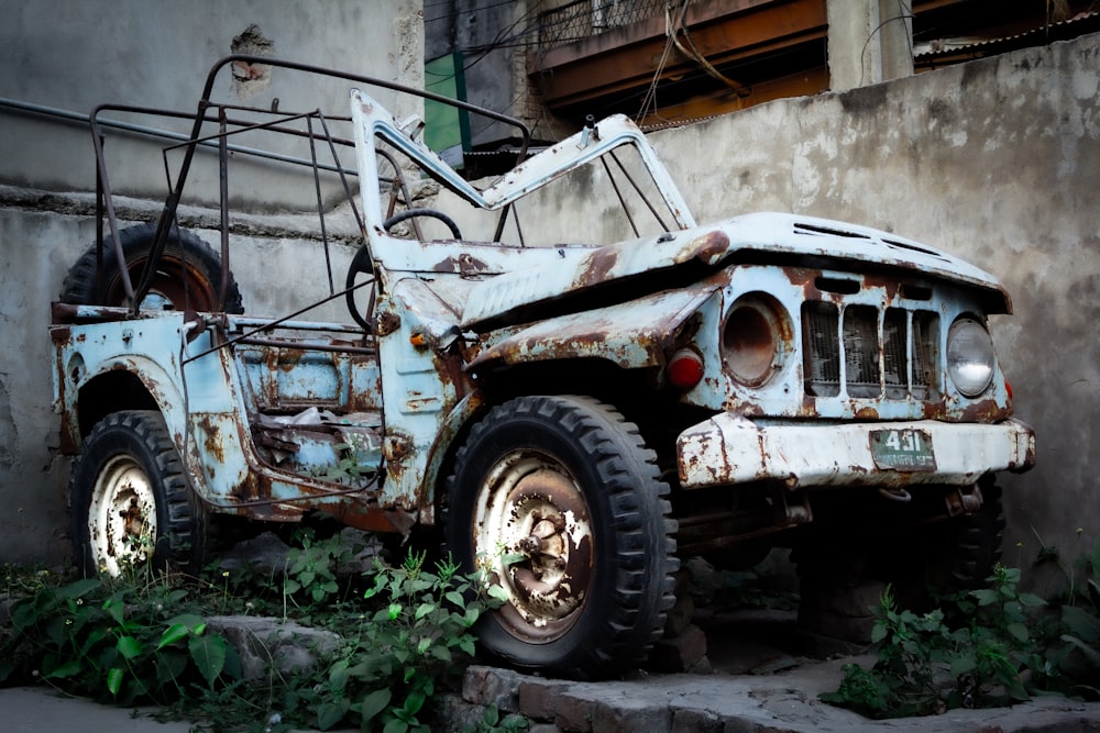 white and brown vintage car