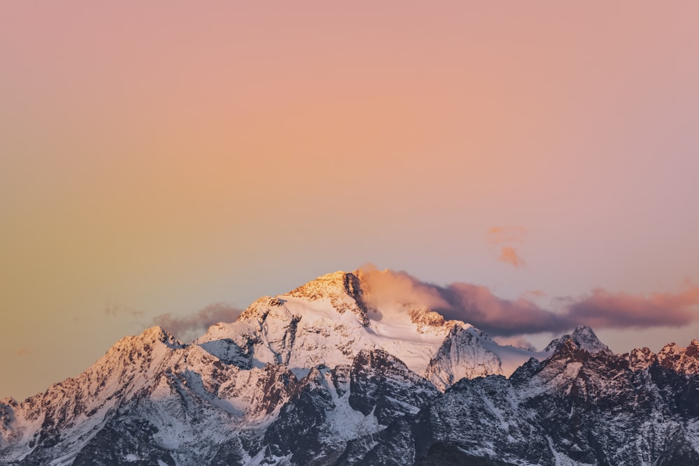 snow covered mountain under blue sky during daytime