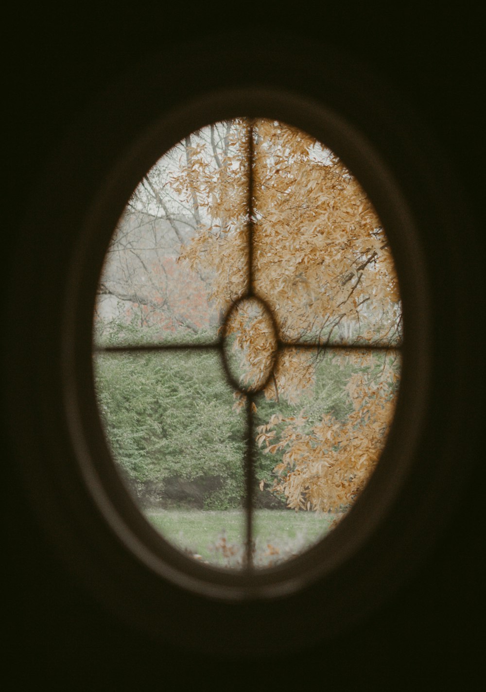 brown wooden framed glass window