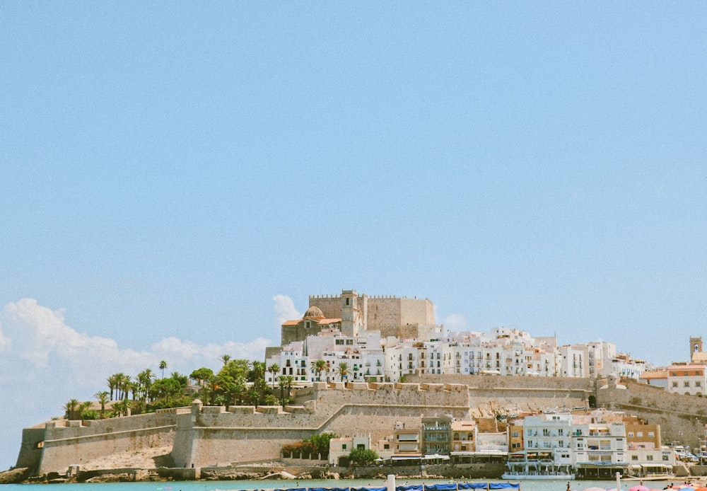 city buildings under blue sky during daytime