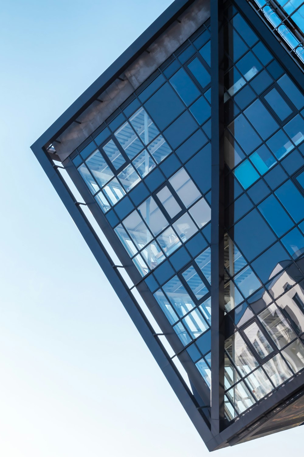 blue and white glass walled building