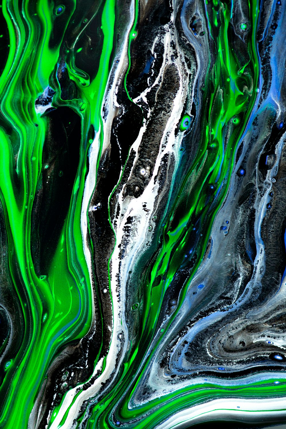 green and black abstract painting