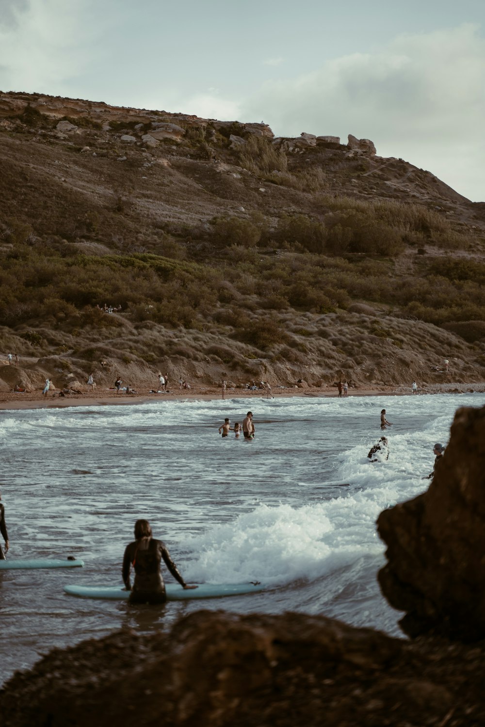 people on beach during daytime