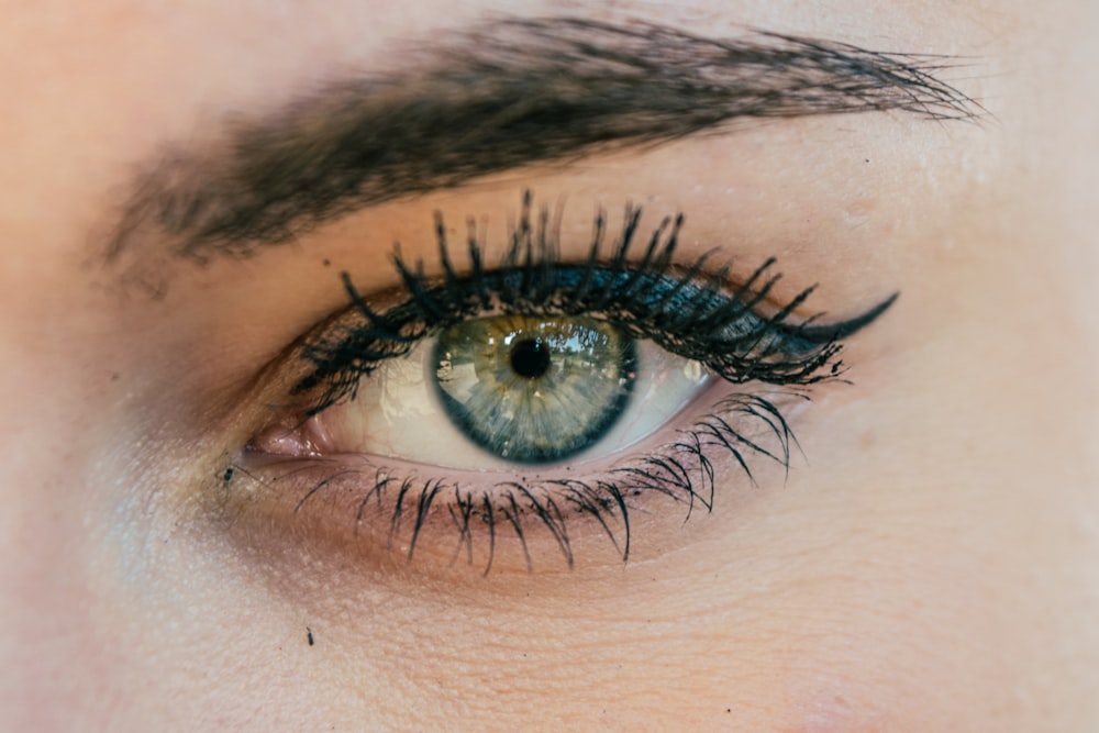 persons eye with blue eyes