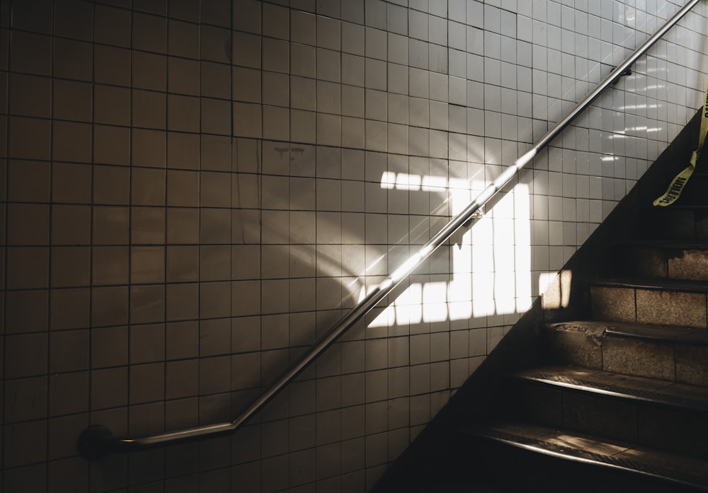 white ceramic tiles and staircase