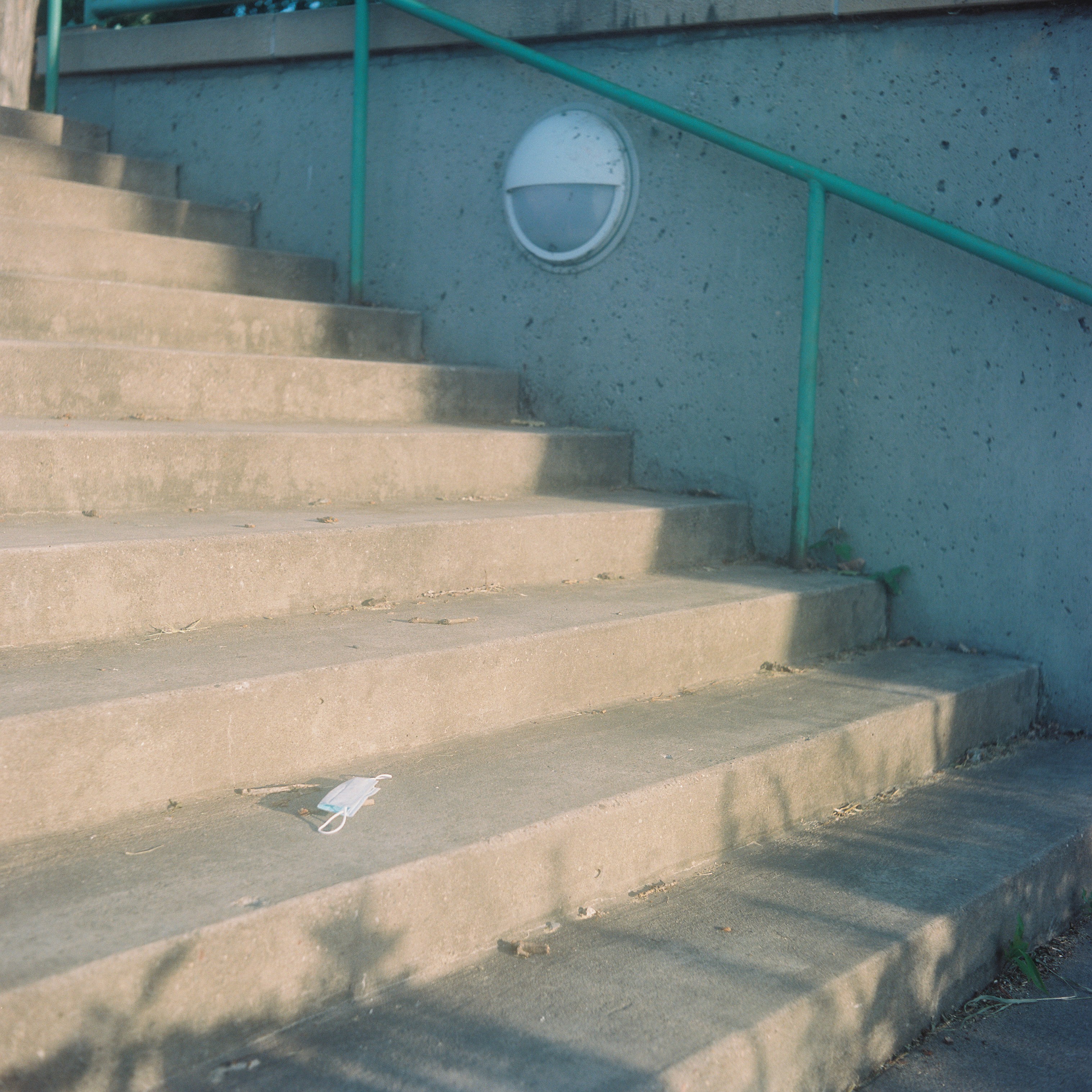 mask on stairs.