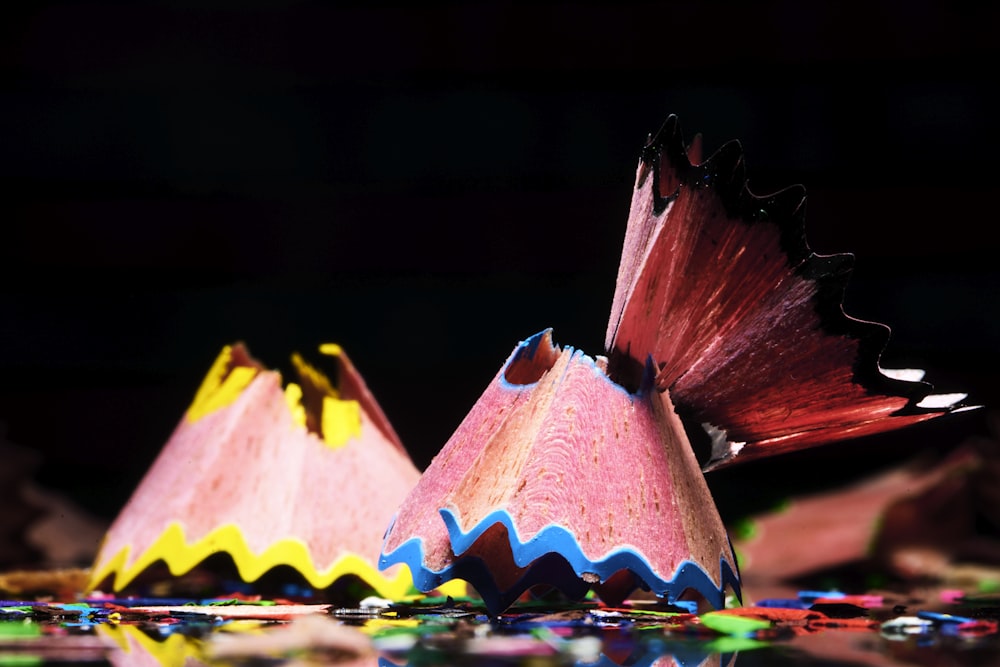 red yellow and green paper boat