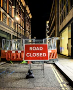 A detailed street closure plan displayed on a computer screen with technical annotations.