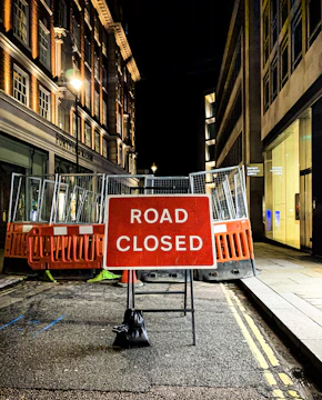 A detailed street closure plan displayed on a computer screen with technical annotations.