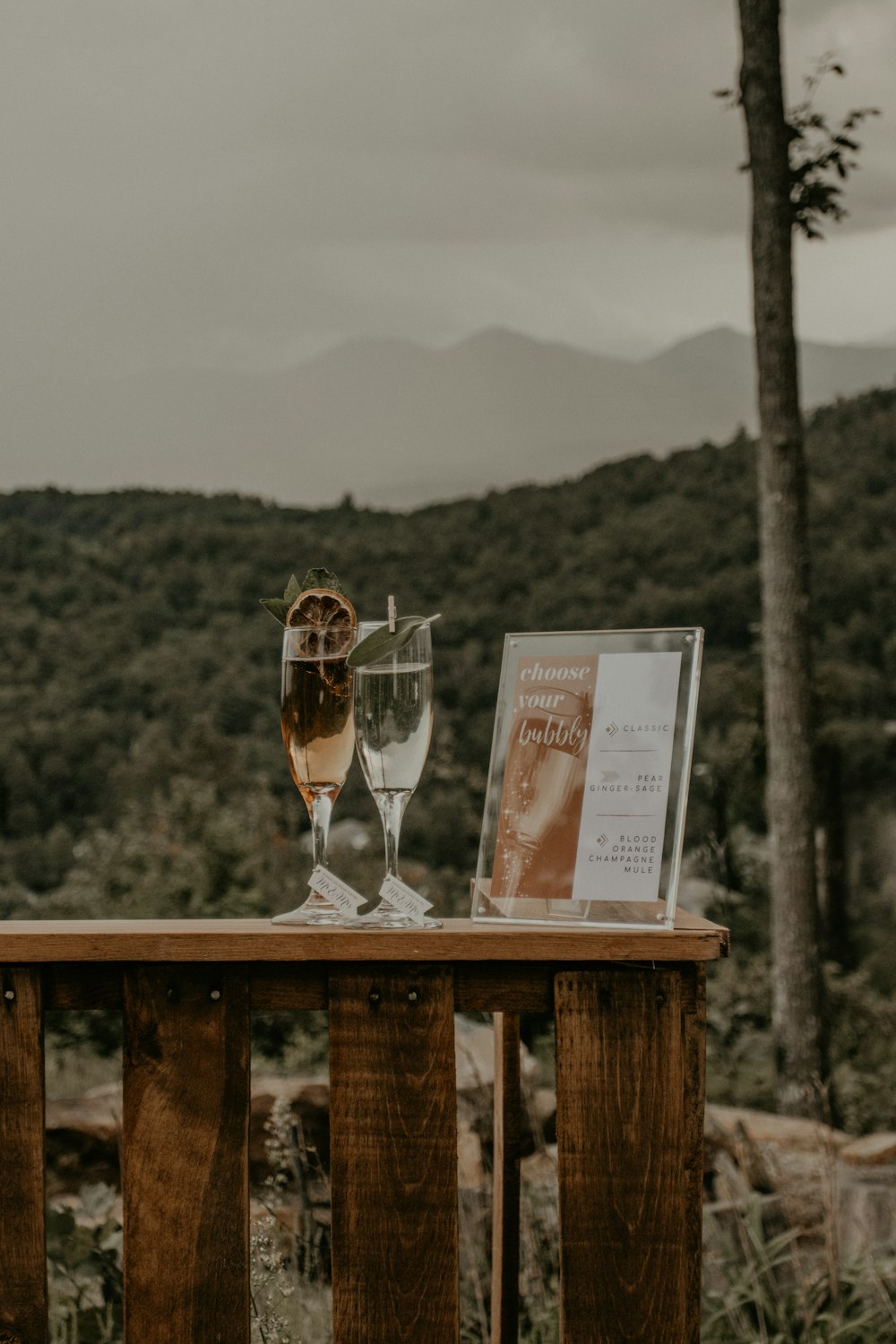 clear wine glass on brown wooden table