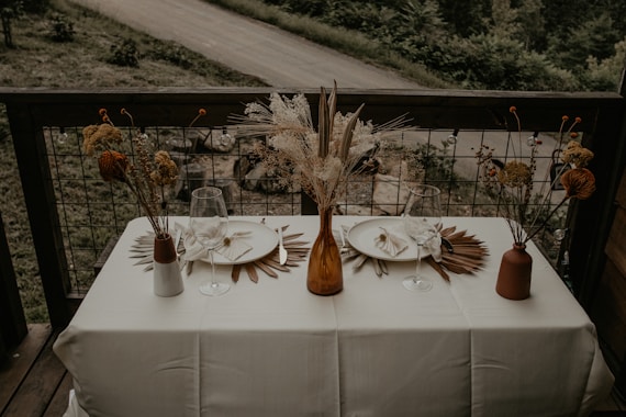 white ceramic plates on table
