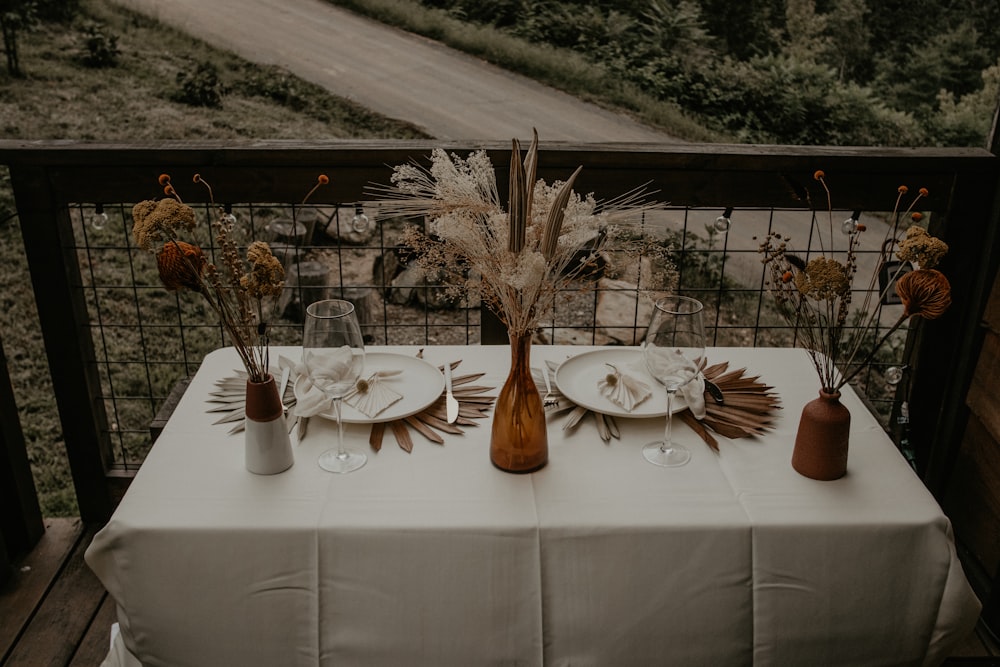 white ceramic plates on table