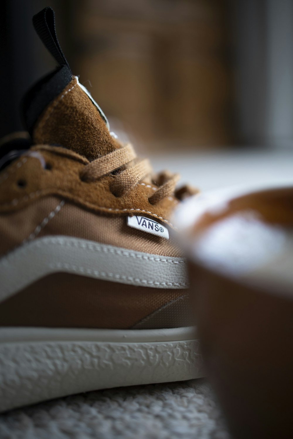 brown and white nike low top sneakers