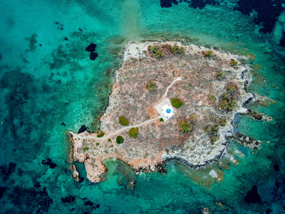 aerial view of island in the middle of the sea