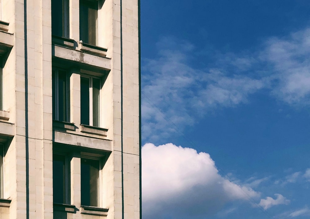 white concrete building under blue sky during daytime