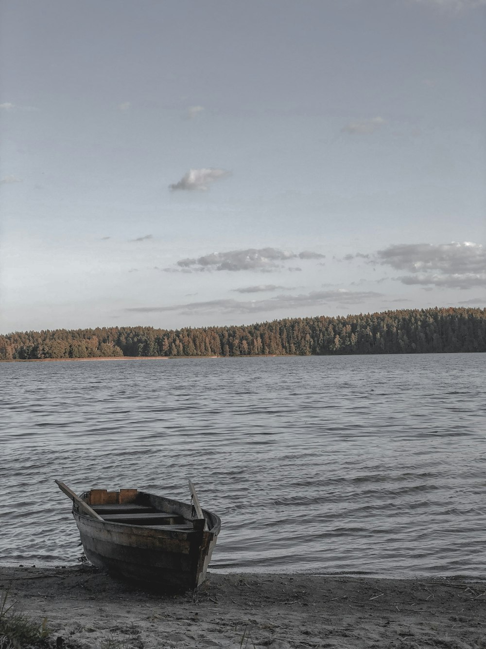 brown boat on body of water during daytime