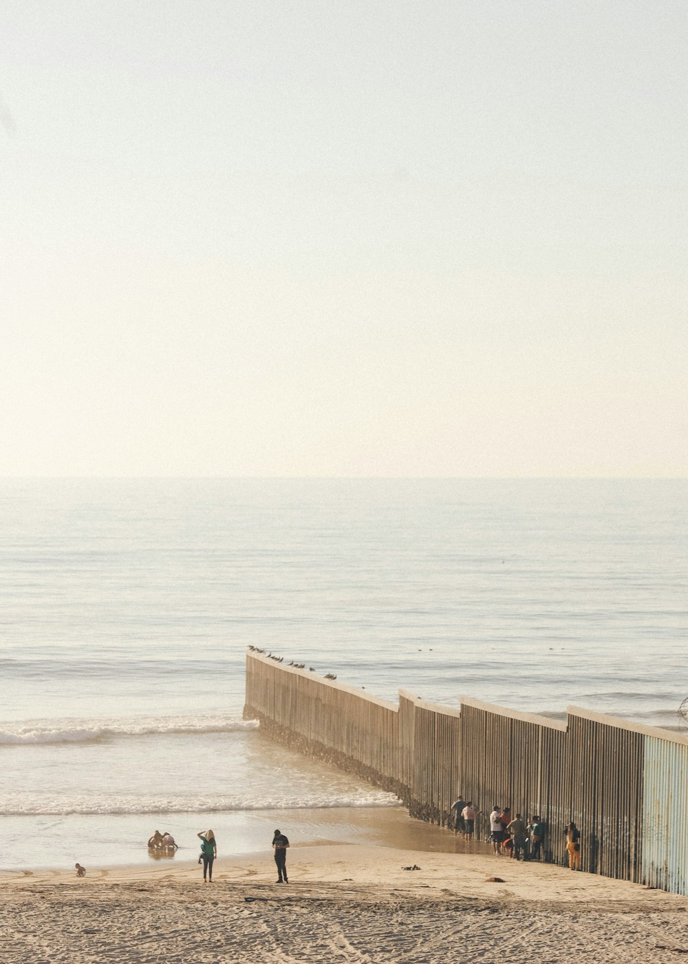 brown wooden dock on sea during daytime