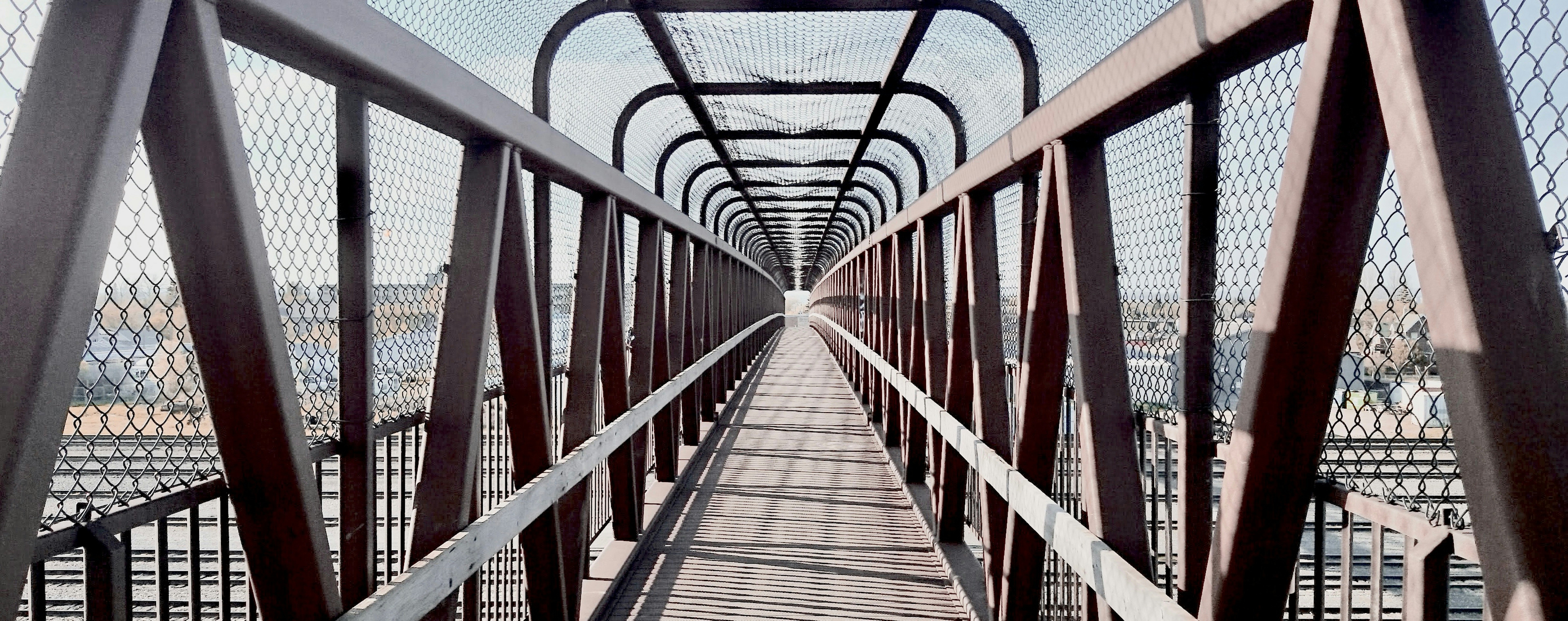 Red and gray metal bridge