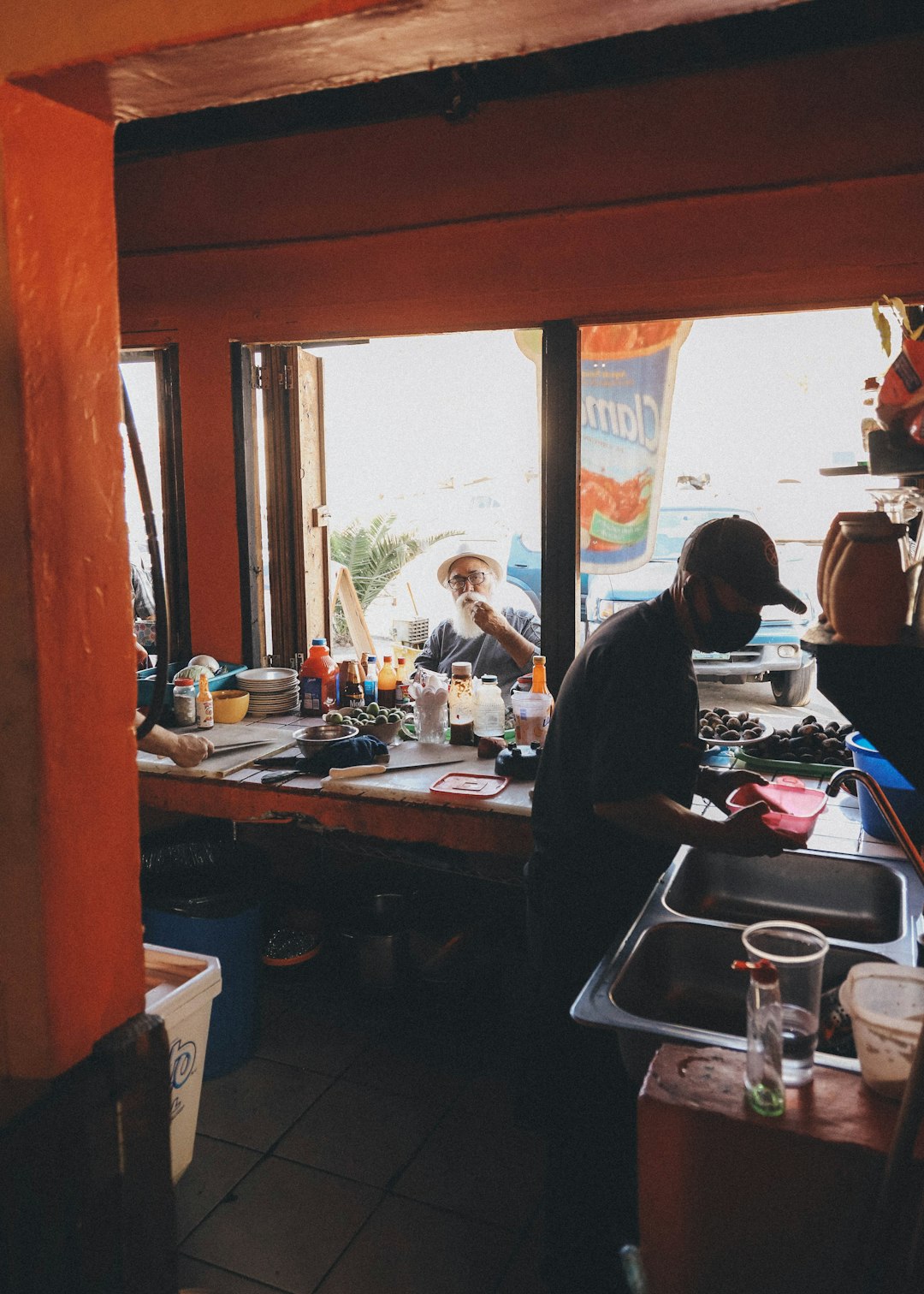 people sitting on chair near table during daytime