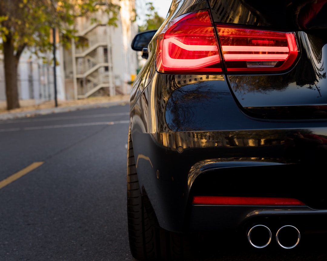 black car on road during daytime