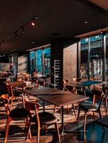 A welcoming dining area bathed in natural light, reflecting the positive ambience of kokkum cafe.