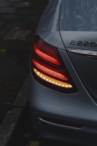 black car on gray concrete road