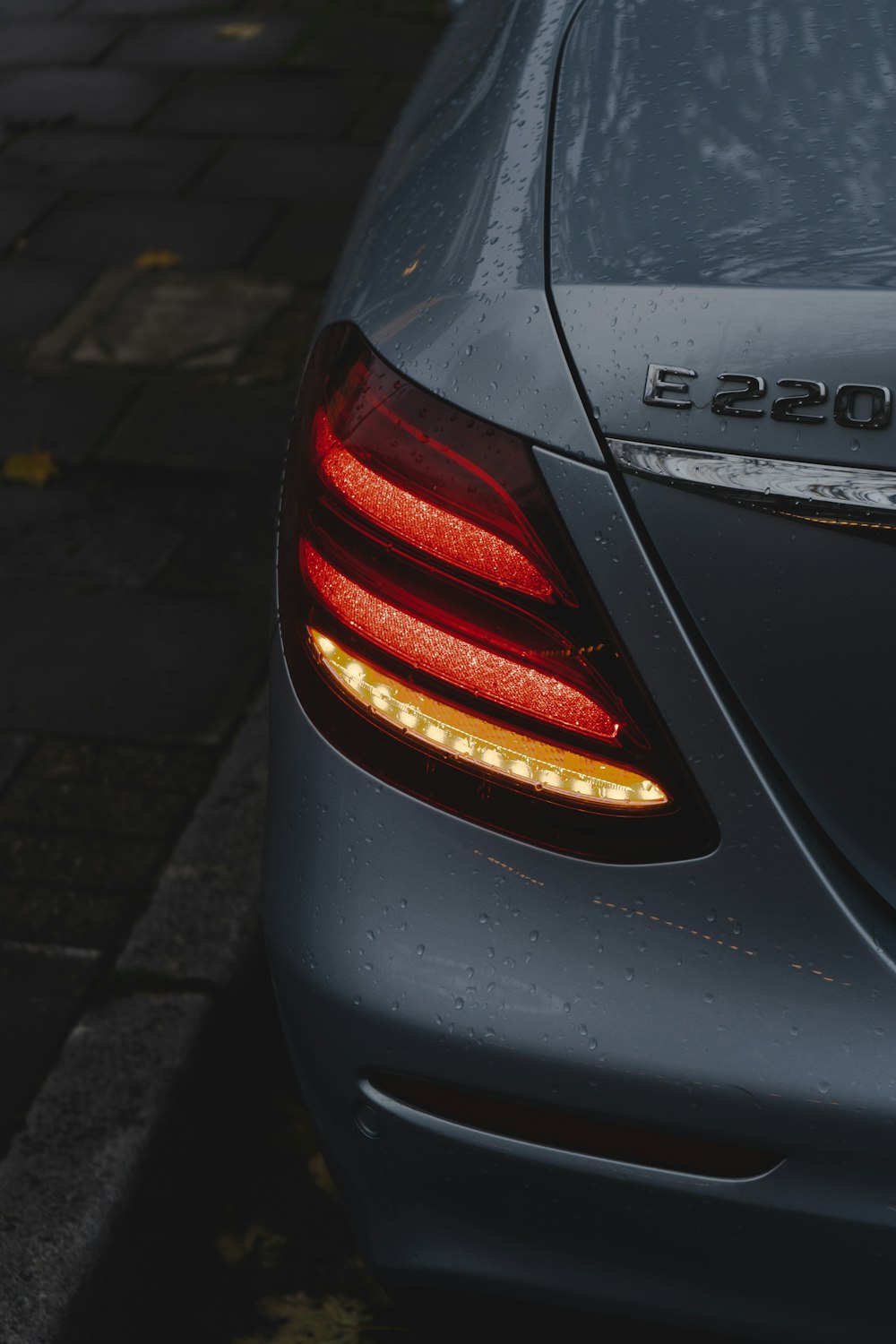 black car on gray concrete road