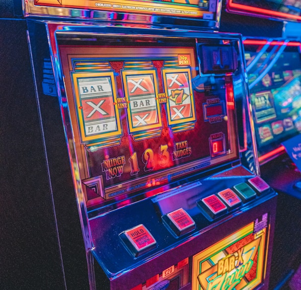 slot machine with lights turned on in the dark