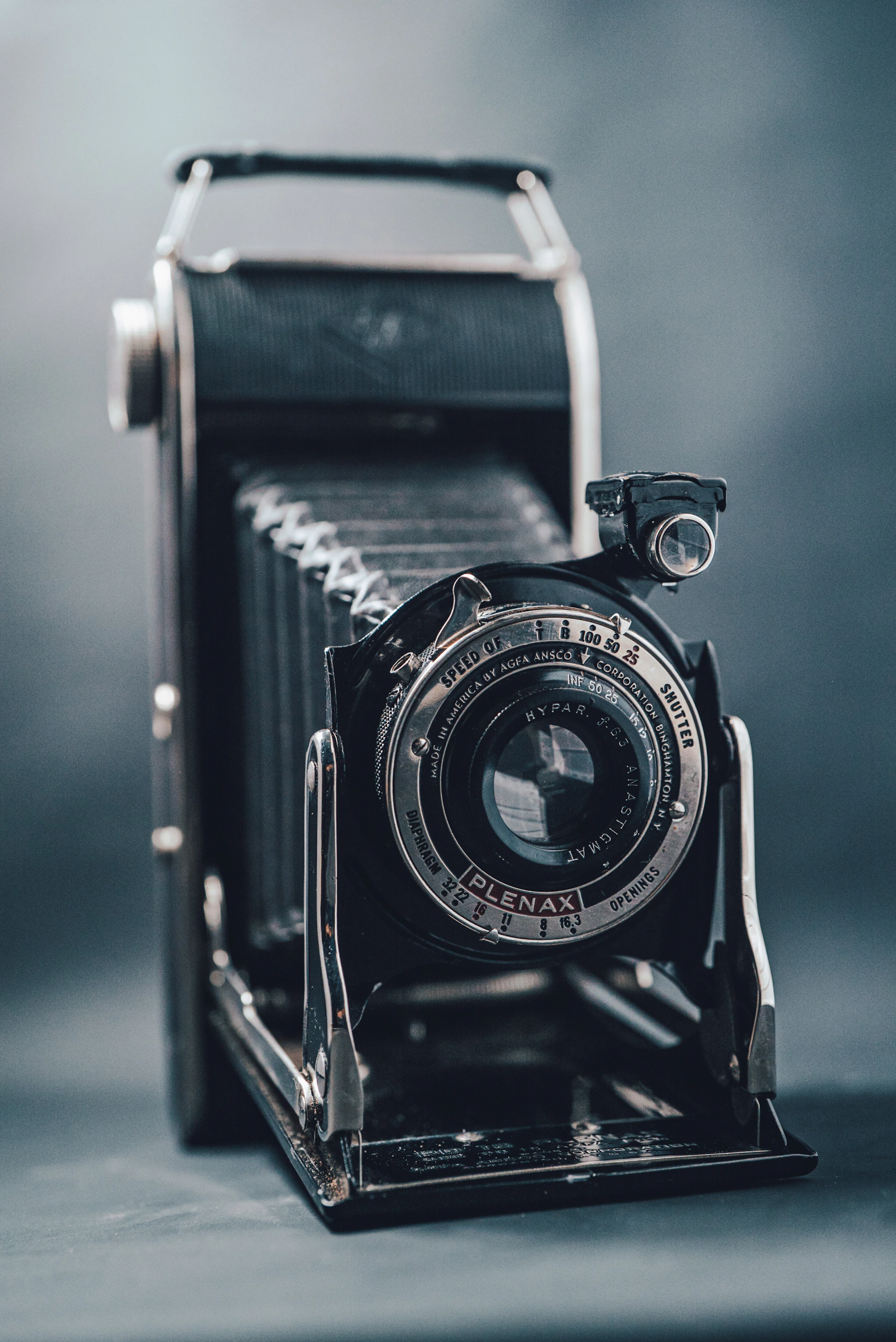 black and silver camera in close up photography
