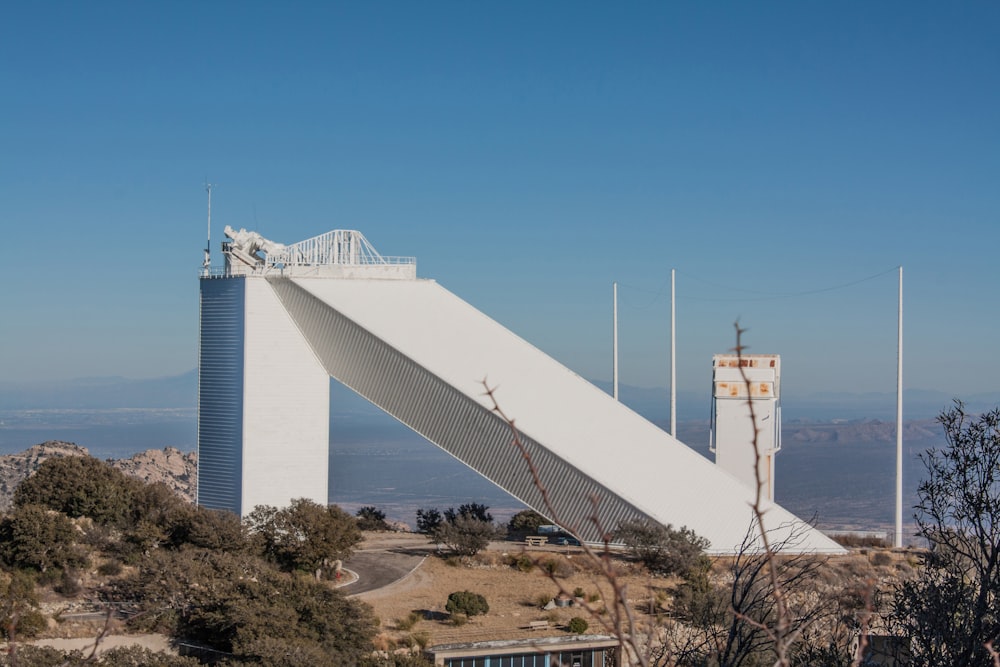 white concrete building under blue sky during daytime