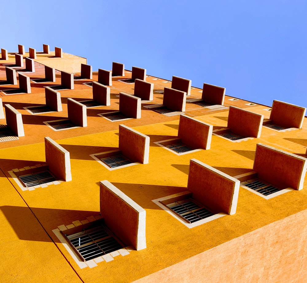 brown concrete building under blue sky during daytime