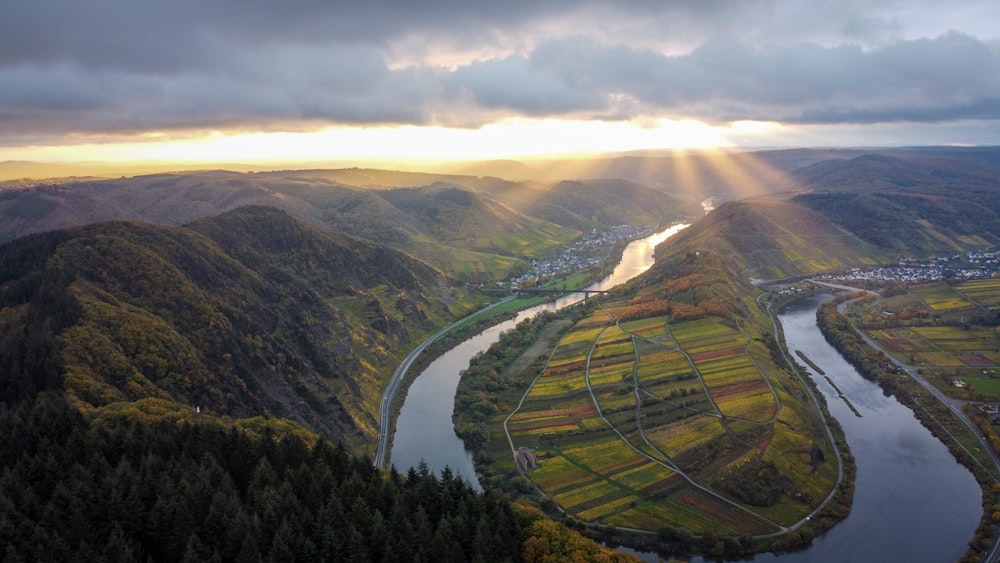 aerial view of green mountains and trees during daytime