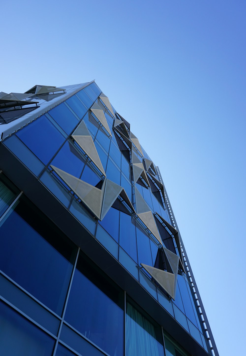 gray concrete building under blue sky during daytime