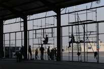Construction workers collaborating on a commercial building site.