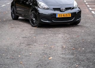 black honda sedan on road during daytime