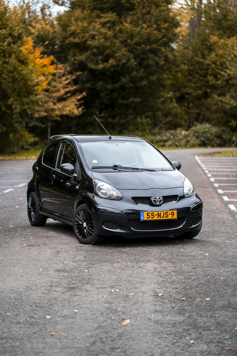 black honda sedan on road during daytime