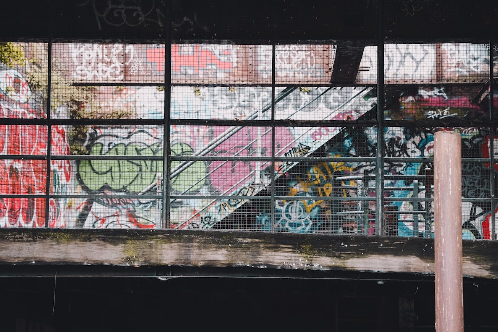 blue red and green graffiti on wall