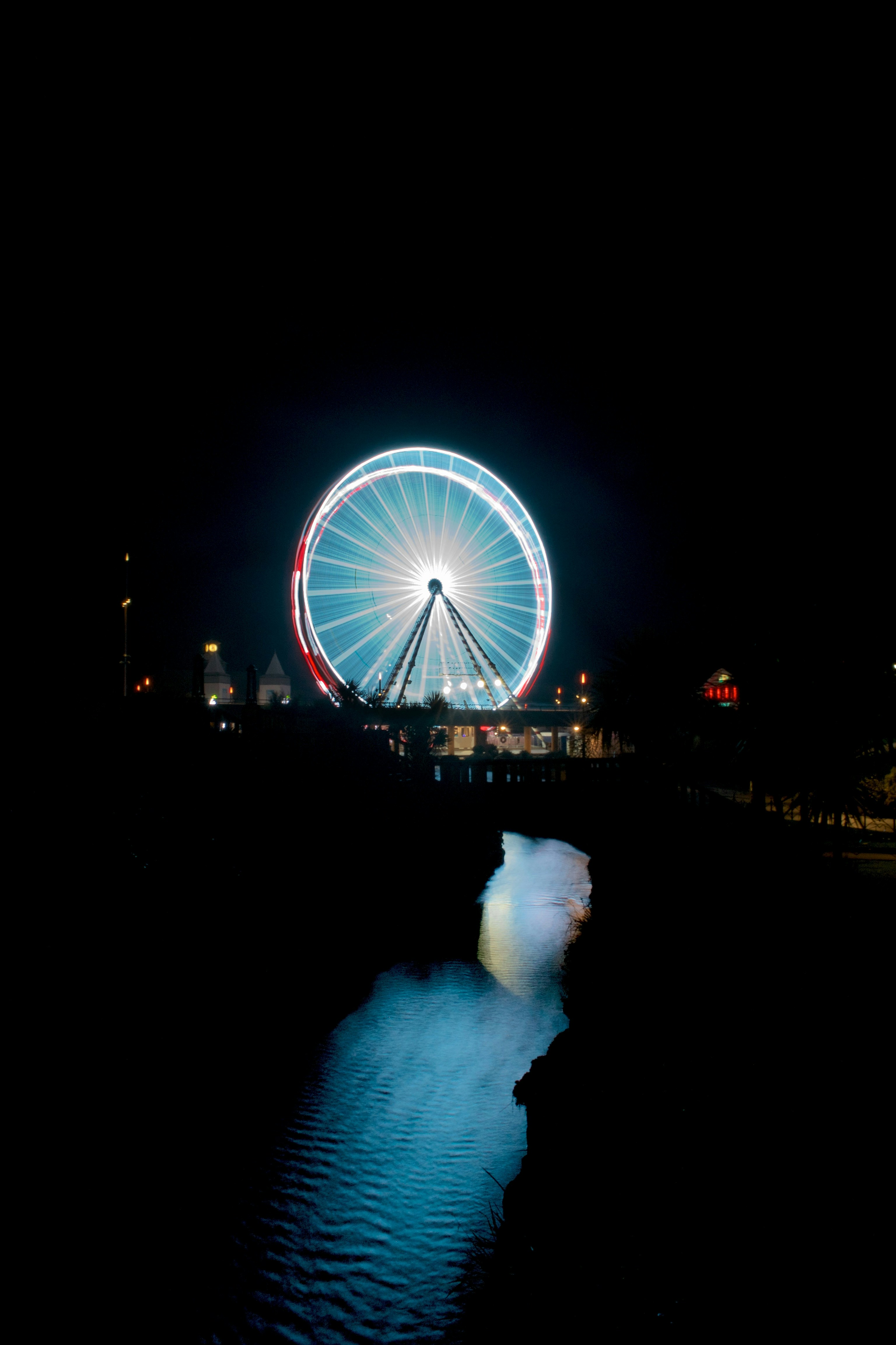 white ferris wheel during night time